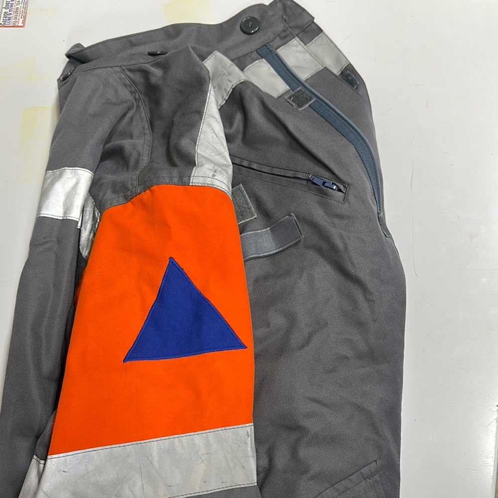 Gray and Orange Work Jacket with Blue Triangle
